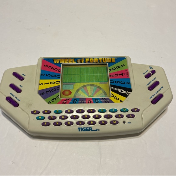 Tiger Wheel of Fortune Electronic Handheld game - Picture 9 of 10